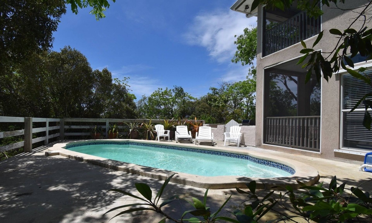 Old Man Bay House | Quiet, private nature retreat with pool and ocean views.