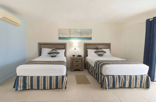 Dover Hotel | Balcony Retreat Overlooking the Pool Steps from the Beach