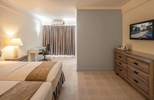 Dover Hotel | Balcony Retreat Overlooking the Pool Steps from the Beach