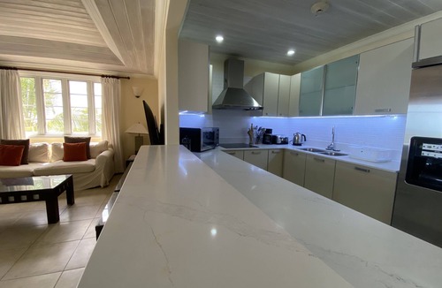 St. Lawrence Gap Apartment | Iconic upscale apartment in St Lawrence Gap with large beachfront balcony