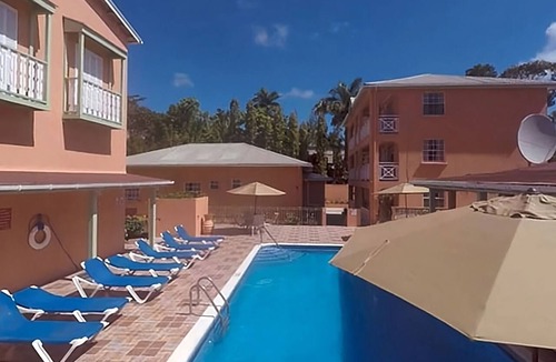 Worthing Apartment | Wake Up Steps from Worthing Beach & Island Charm