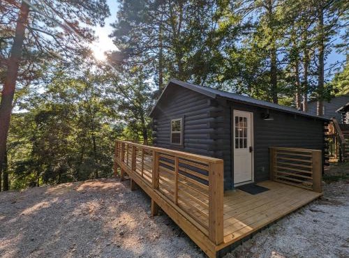 Cabin #6 with hot tub deck and sunset view at Loblolly Pines in Eureka Springs