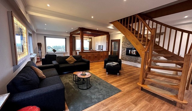 Multi-generation house right on the water with terrace and garden in Steenodde