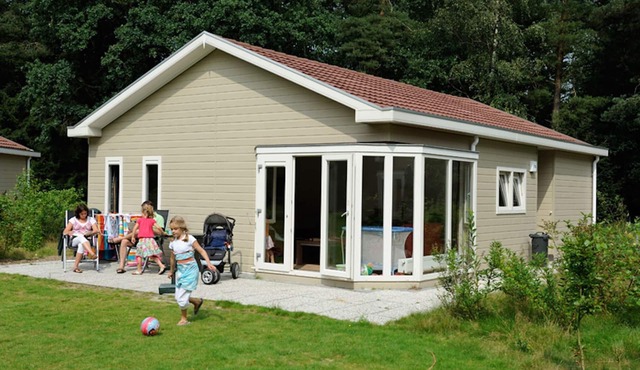 Nice chalet with dishwasher surrounded by greenery in Appelscha