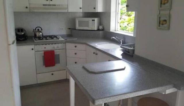 Shades Apt 1 – Spacious Two-Bedroom Garden Apartment Near the Pool