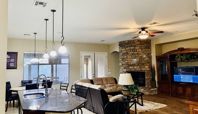 This spacious house is the perfect blend of comfort and convenience. in Phoenix