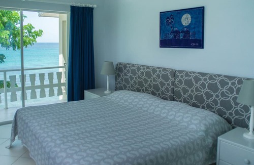 Fitts Village Apartment | Beautiful 2-Bedroom Apartment right on the beach in this tranquil little bay